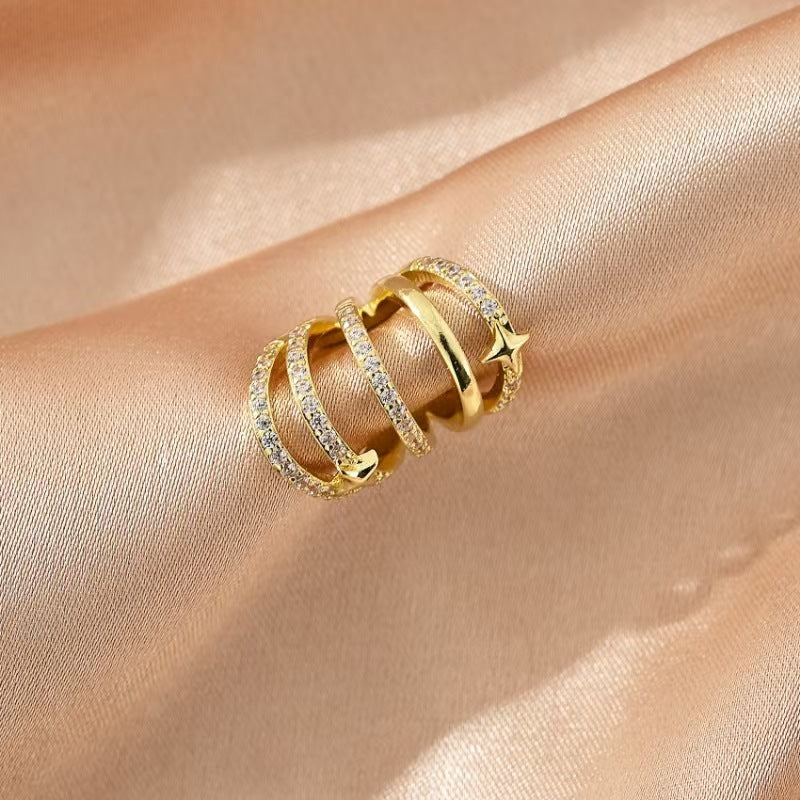 Boucles d'oreilles pendantes pour femme avec design spirale et zircone