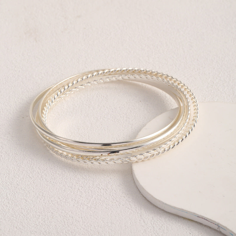 Ensemble de bracelets pour femme aux designs tressés et épurés