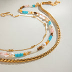 Collier pour femme avec perles et détails sphériques