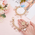 Bracelet fantaisie avec breloques fleurs