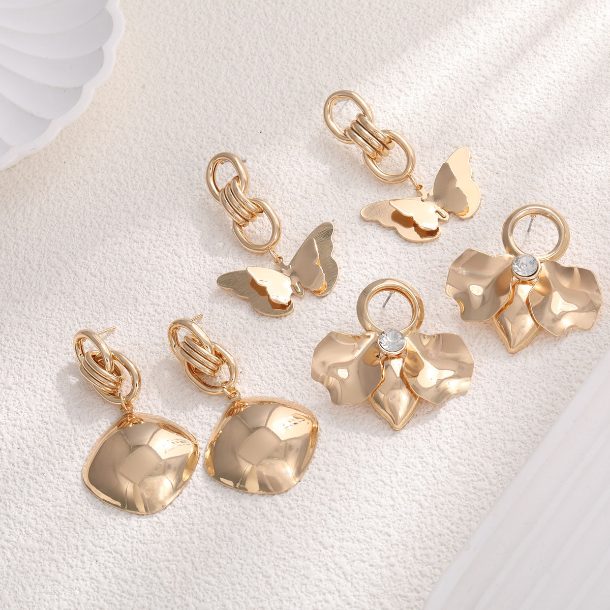 Boucles d'oreilles élégantes pour femme motifs floraux