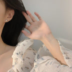 Boucles d'oreilles puces en forme de cœur dorées pour femme