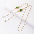 Boucles d'oreilles pendantes perles et pierres vertes