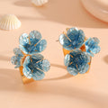 Boucles d'oreilles pour femme motif floral moderne