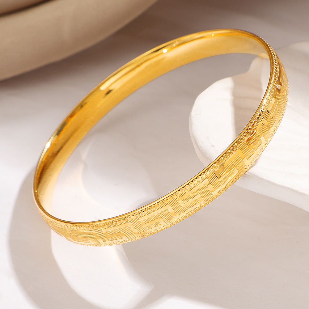 Bracelet jonc gravé doré pour femme