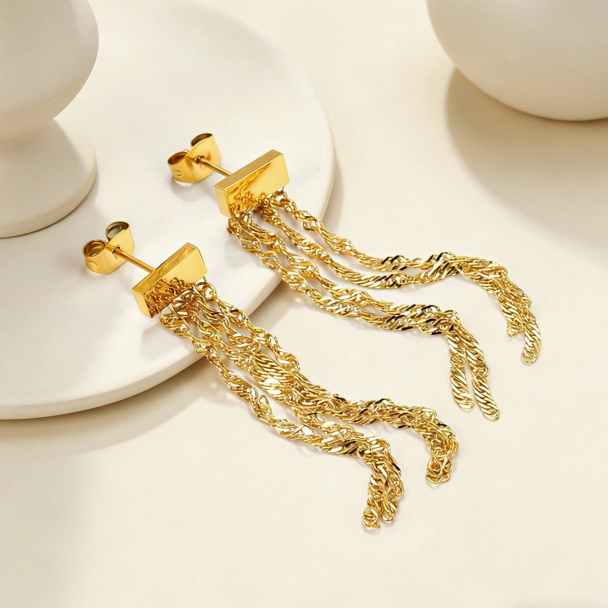 Boucles d'oreilles pendantes avec chaînes et cristal