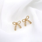 Boucles d'oreilles nœud pour femme avec cristaux étincelants