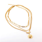 Collier multi-rangs pour femme avec pendentif boussole