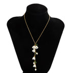 Boucles d'oreilles pour femme avec pendentifs floraux et perles