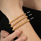 Ensemble de bracelets élégants dorés à perles pour femme