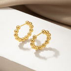 Boucles d'oreilles créoles perlées pour femme