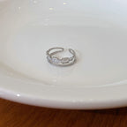 Bague ouverte pour femme avec zircons étincelants
