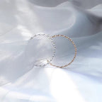 Boucles d'oreilles pour femme au design incurvé moderne