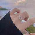Bague élégante et délicate pour femme avec motifs d'étoiles et de fleurs