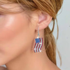 Boucles d'oreilles statement étincelantes avec longs pompons en strass