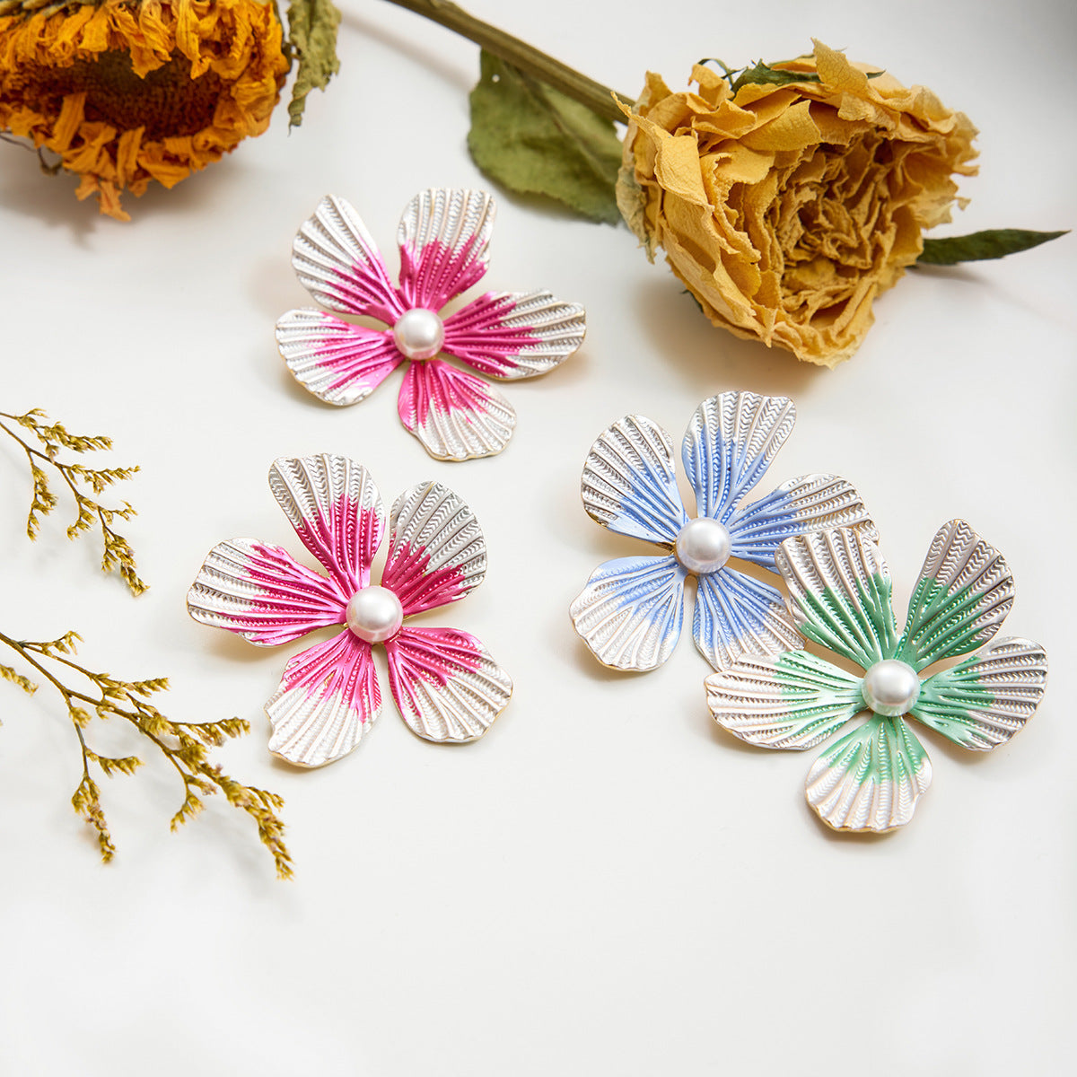 Boucles d'oreilles pendantes fleurs en acier inoxydable