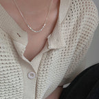 Collier moderne à pendentif géométrique