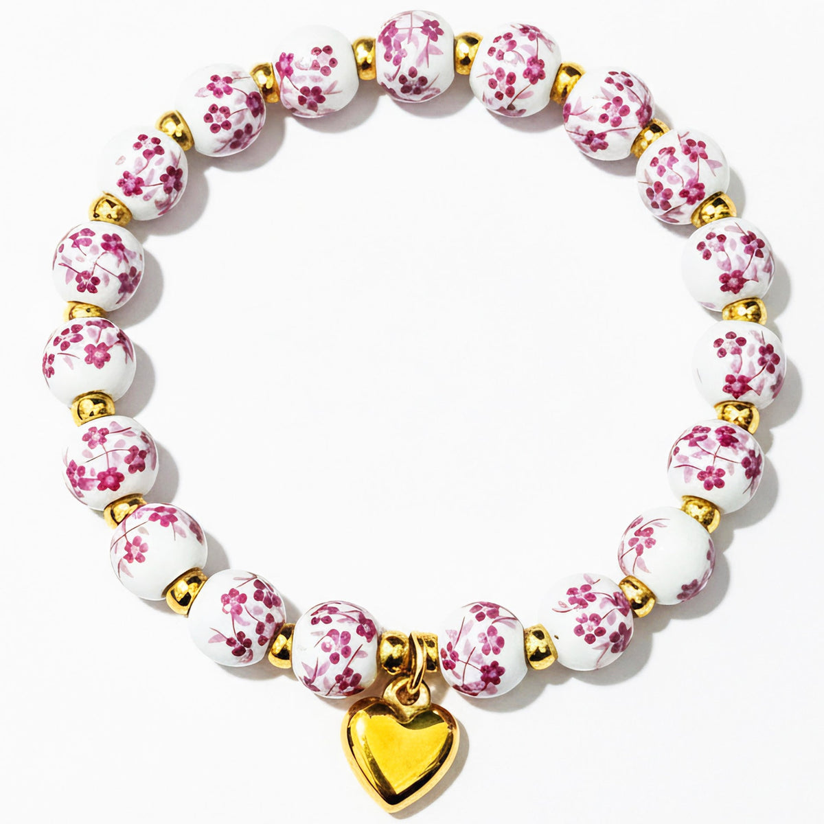 Bracelet pour femme au design floral avec accents dorés