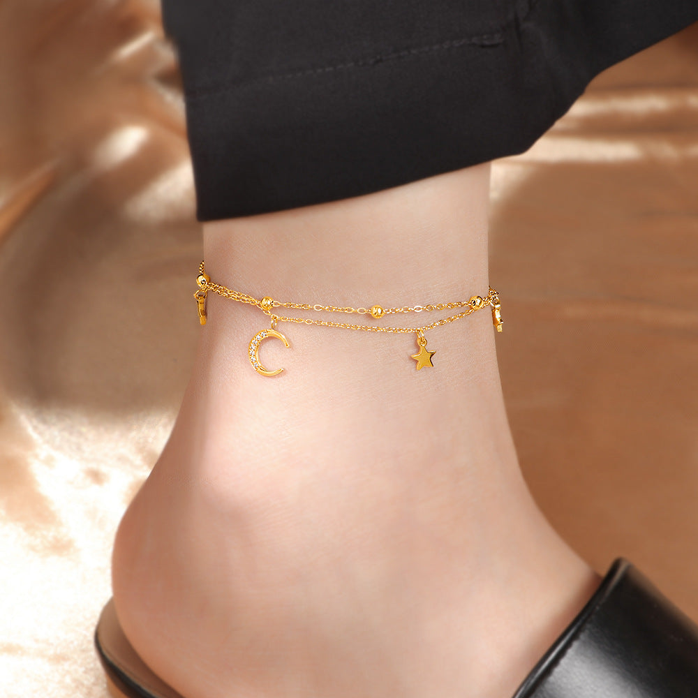 Chaîne de cheville pour femme avec pendentifs scintillants motif lune