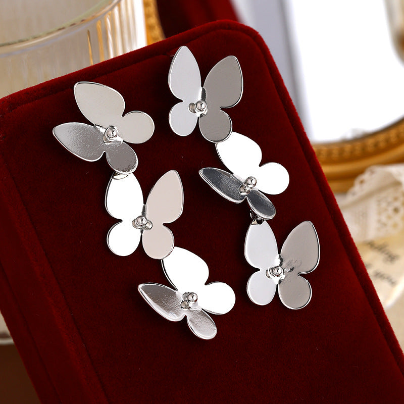Clous d'oreilles pour femme au design papillon élégant