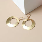 Boucles d'oreilles pendantes pour femme au design géométrique