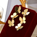 Clous d'oreilles pour femme au design papillon élégant