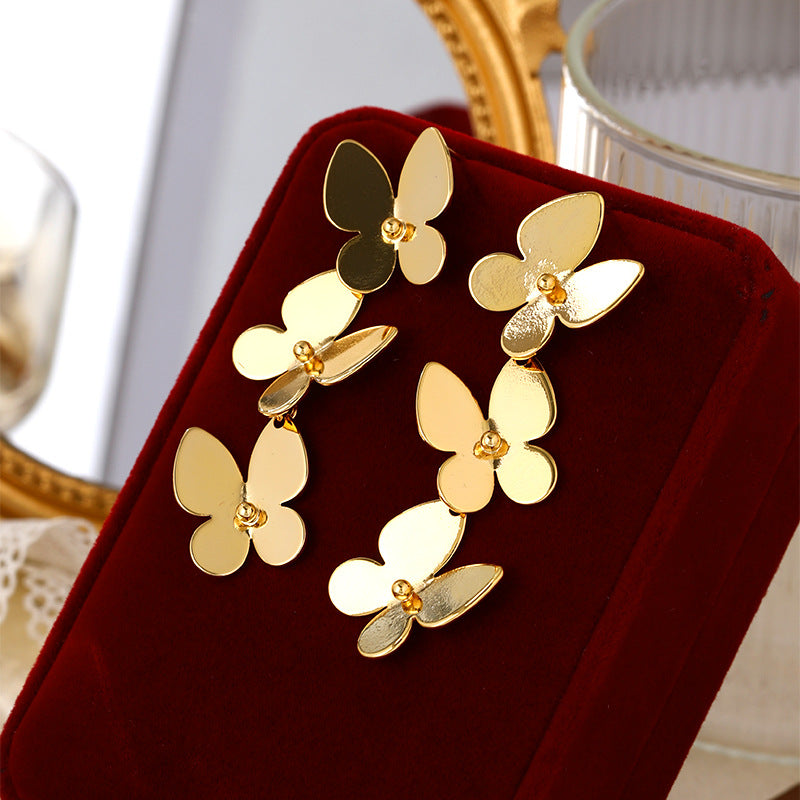 Clous d'oreilles pour femme au design papillon élégant