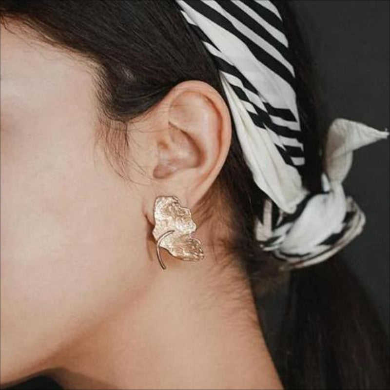Boucles d'oreilles pendantes pour femme en forme de feuille