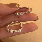 Boucles d'oreilles pour femme avec perles et design en argent