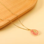 Collier pour femme avec pendentif goutte étincelant et acier inoxydable doré