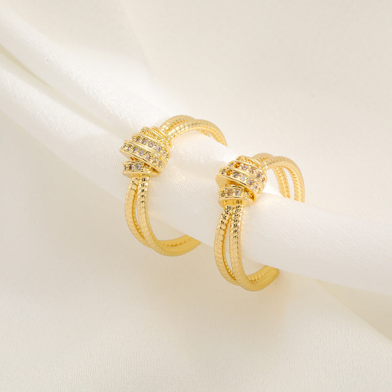 Bague pour femme au design multicouche artistique avec zircones