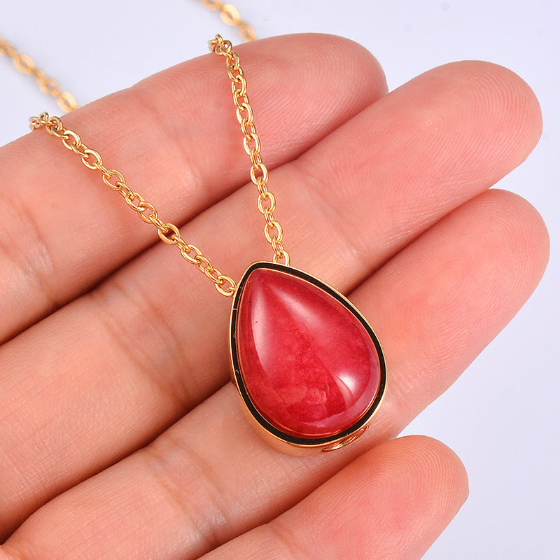 Collier doré pour femme avec pendentif goutte en pierre