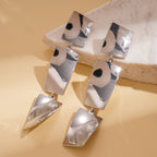 Boucles d'oreilles pendantes pour femme motif feuille
