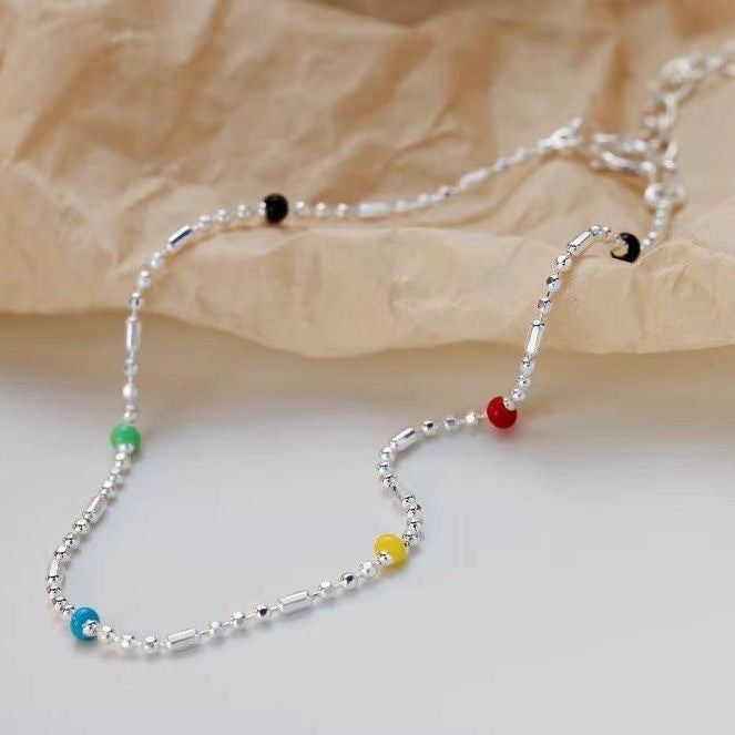 Bracelet à chaîne et perles multicolores délicat