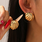 Boucles d'oreilles pour femme en forme de coquillage