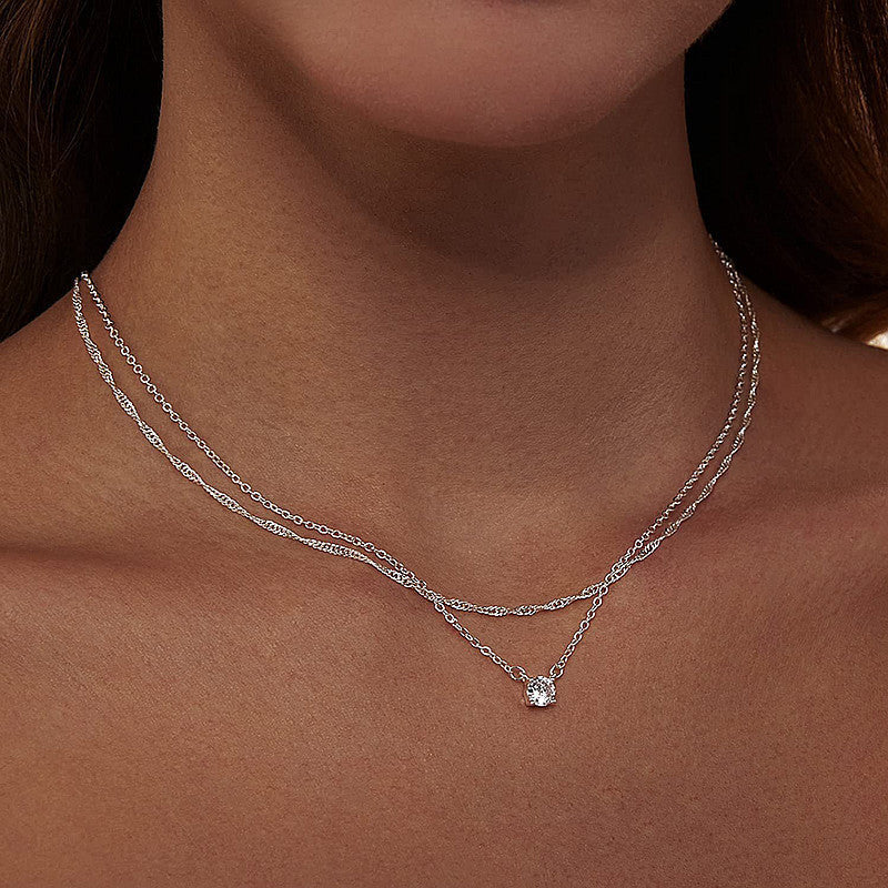 Collier doré superposé