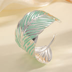 Bracelet ouvert pour femme au design de feuille tropicale