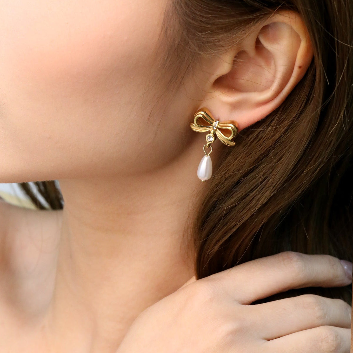 Boucles d'oreilles pendantes pour femme design nœud