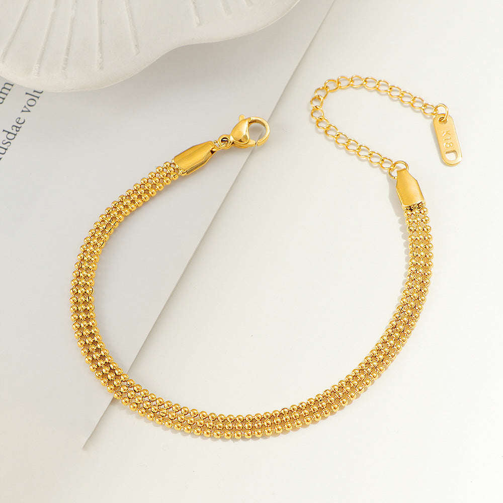 Bracelet chaîne texturé doré pour femme