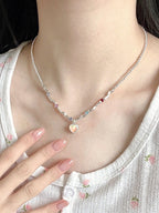 Collier avec pendentif en pierre précieuse en forme de cœur