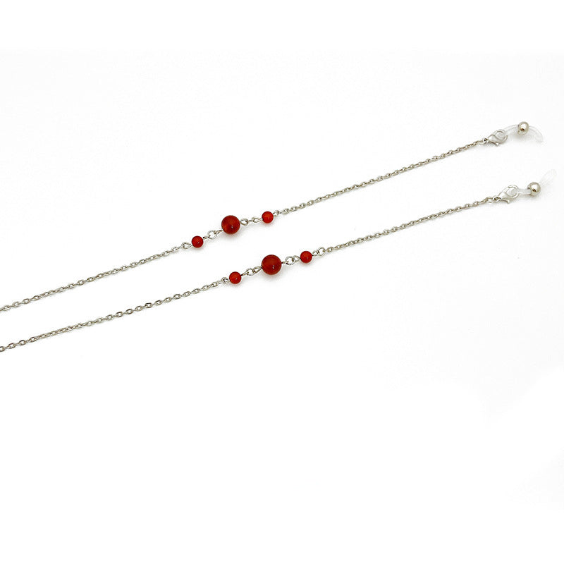 Chaîne porte-bijoux élégante avec accents rouges