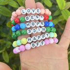 Bracelet de l'amitié en perles pastel