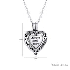 Collier pour femme avec médaillon cœur gravé