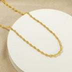Collier chaîne torsadée dorée pour femme