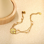 Bracelet pour femme avec pendentif fleur et perles