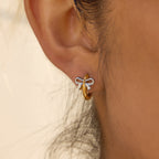 Créoles pour femme motif nœud en acier inoxydable hypoallergénique