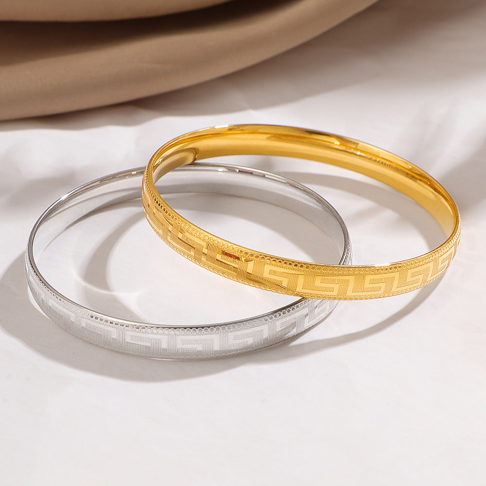 Bracelet jonc gravé doré pour femme