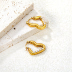Boucles d'oreilles pendantes cœur pour femme avec perles