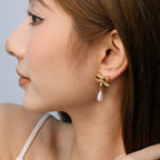 Boucles d'oreilles pendantes pour femme design nœud