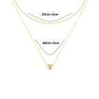Collier superposé à pendentif cœur